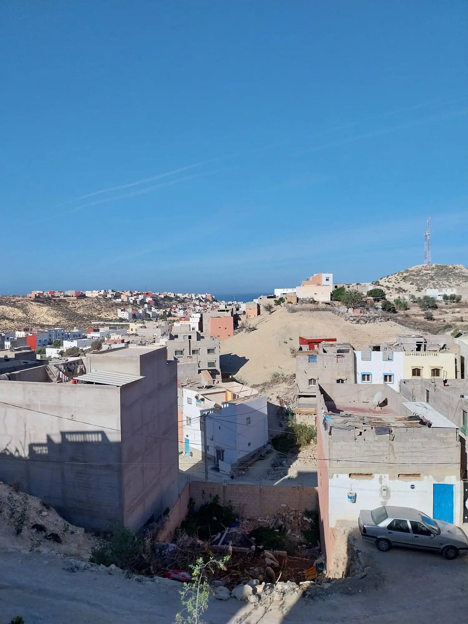 View over the rooftops of Aourir to the Atlantic