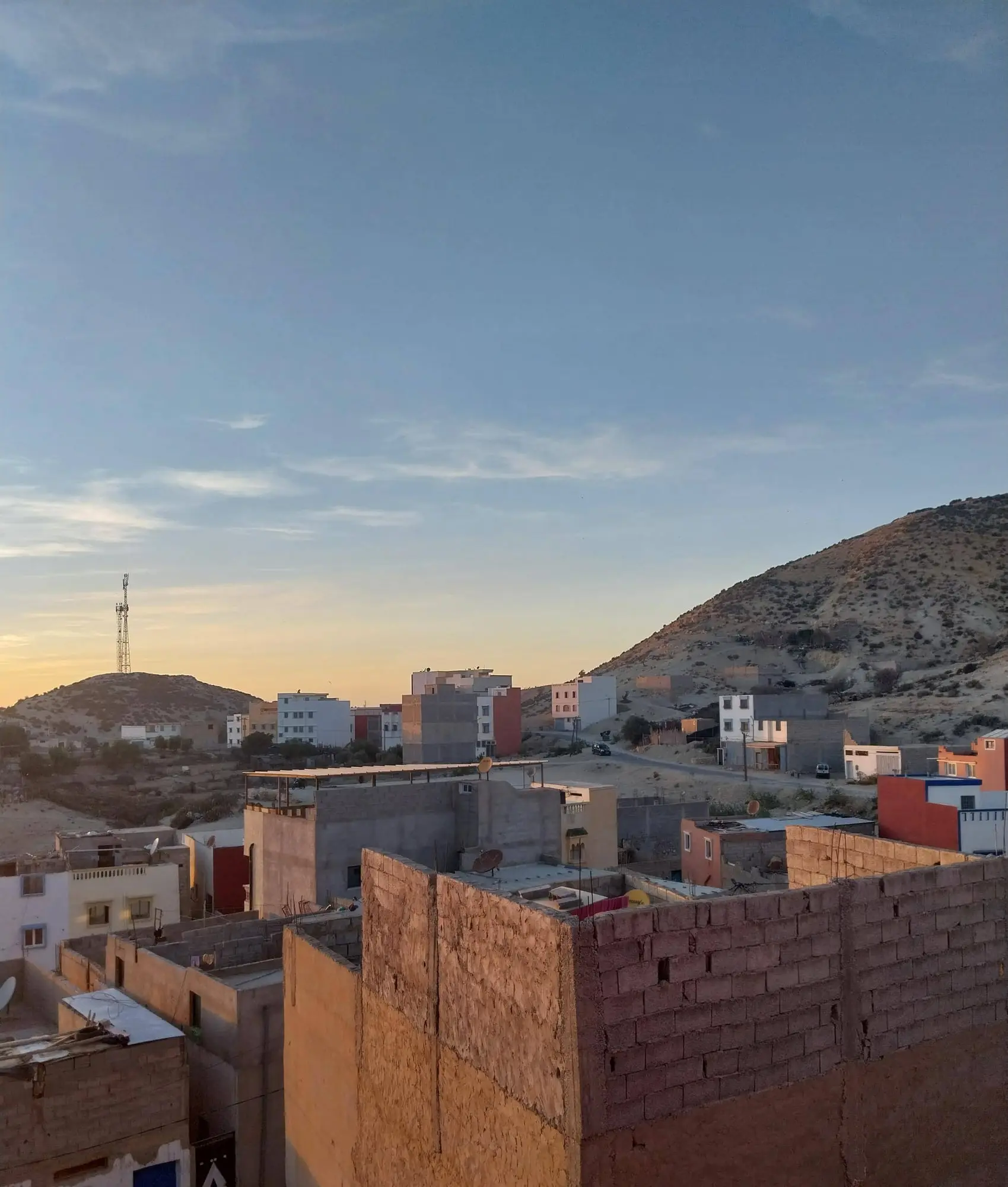 Dusk over the hills and rooftops of Aourir